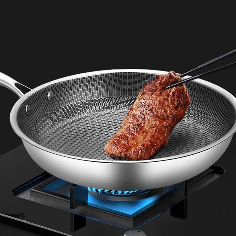 NOMOVA Stainless steel frying pan with non-stick coating for effortless cooking