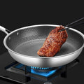 NOMOVA Stainless steel frying pan with non-stick coating for effortless cooking