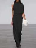 Women's round-neck, sleeveless jumpsuit with flared legs - product image 1