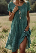 Chic Green Polka Dot Midi Dress with Short Sleeves - product image 1