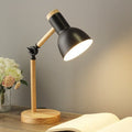 Lámpara de escritorio ajustable moderna con brazo articulado y luz direccional
